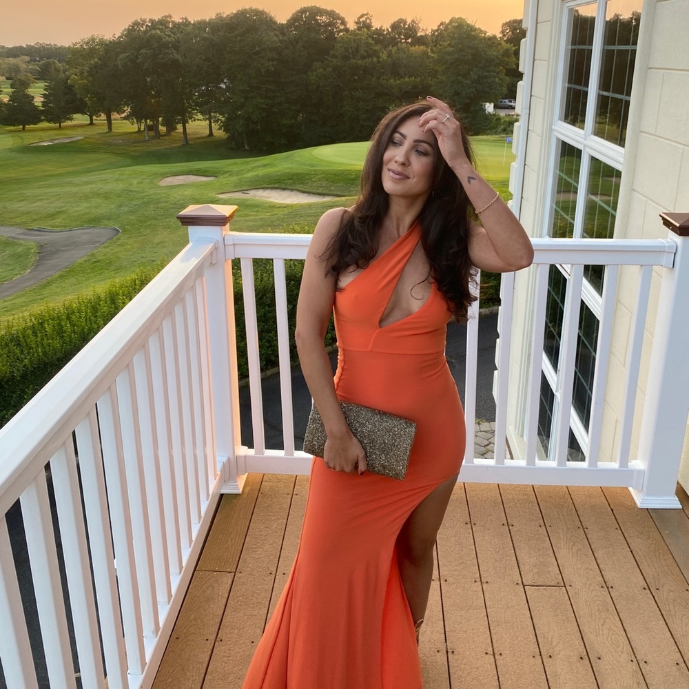 Club London A-symmetrical orange neckline and slit dress